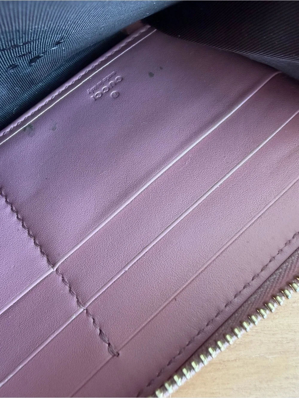 Gucci Pink Embossed GG Zip-Around Leather Wallet